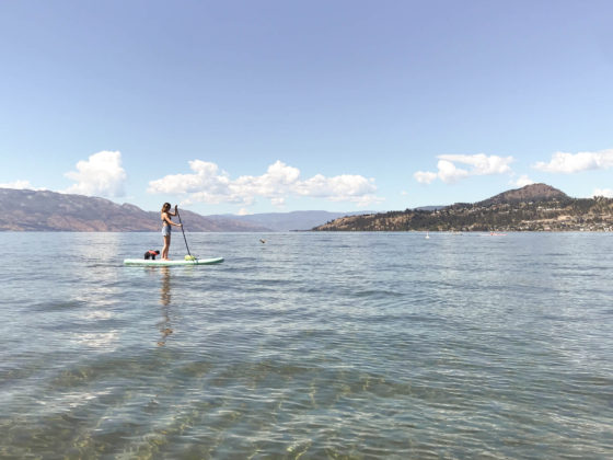 paddling boarding in Kelowna BC at Okanagan Lake. One of the fun things to do in kelowna