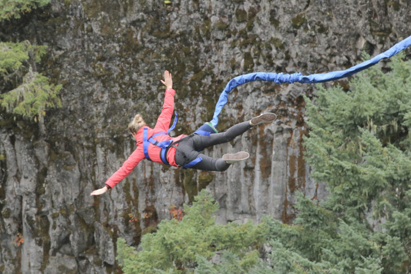 a girl (Christina) bungee jumping. it's one of the best whistler adventures to have