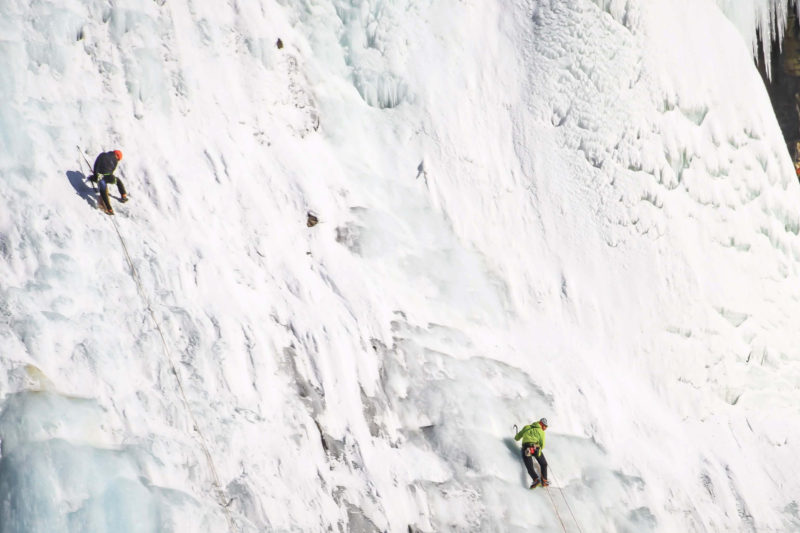 2 men ice climbing whistler in winter